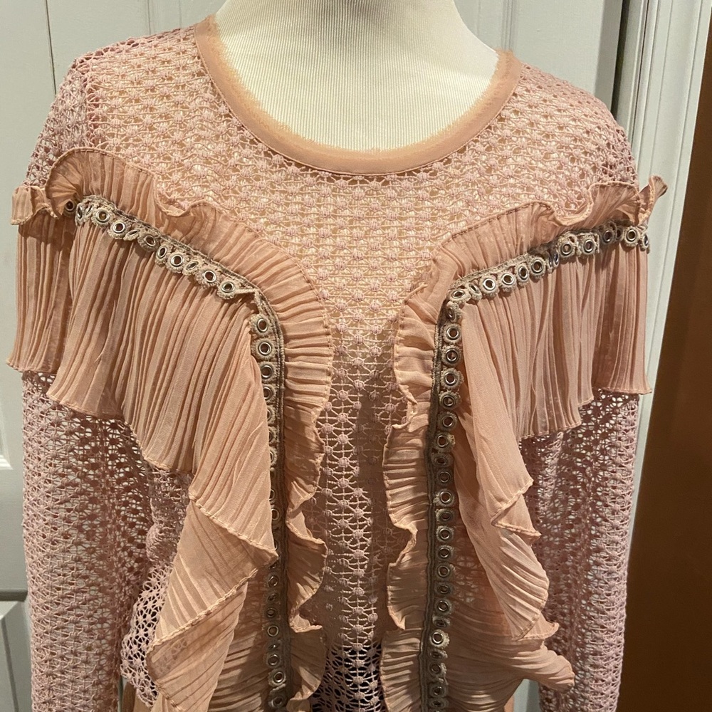Peach like color ruffled top
